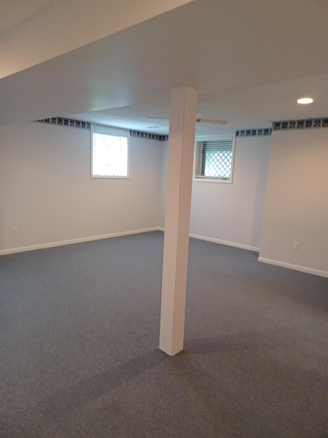 3144 Amsterdam Dr, Clio, MI 48420 - basement featuring dark colored carpet and plenty of natural light