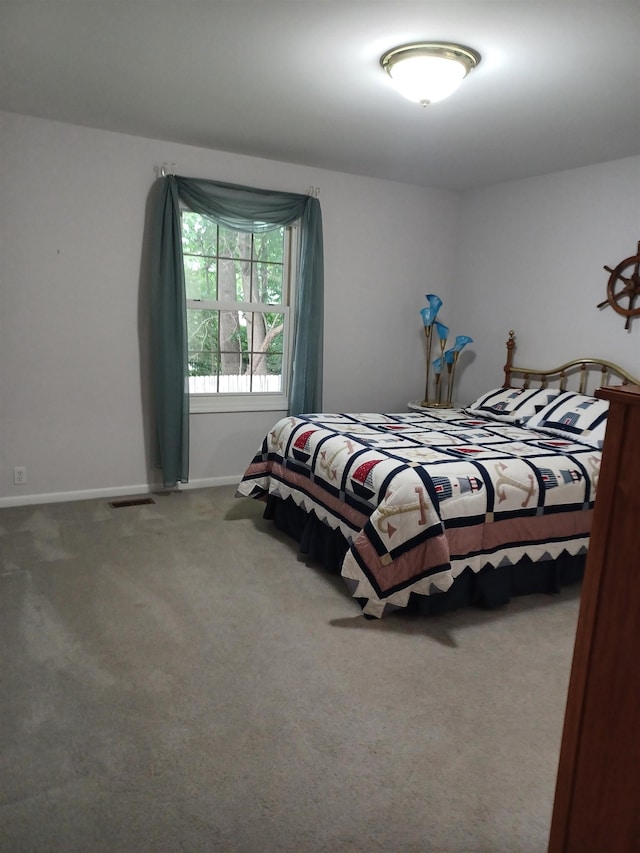 3144 Amsterdam Dr, Clio, MI 48420 - bedroom featuring carpet and baseboards