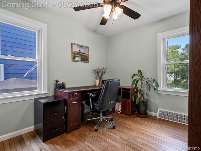 34286 Glover St, Wayne, MI 48184 - home office with light wood-style floors and a ceiling fan