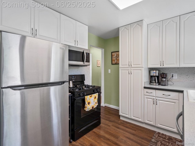 34286 Glover St, Wayne, MI 48184 - kitchen with appliances with stainless steel finishes, decorative backsplash, and white cabinets