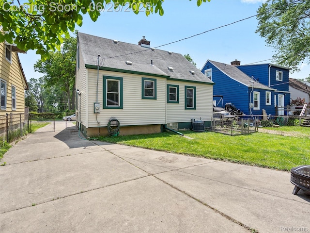 34286 Glover St, Wayne, MI 48184 - rear view of property featuring a chimney