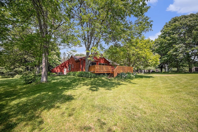 7385 Macomber Ct, Ann Arbor, MI 48103 - view of green lawn featuring a deck