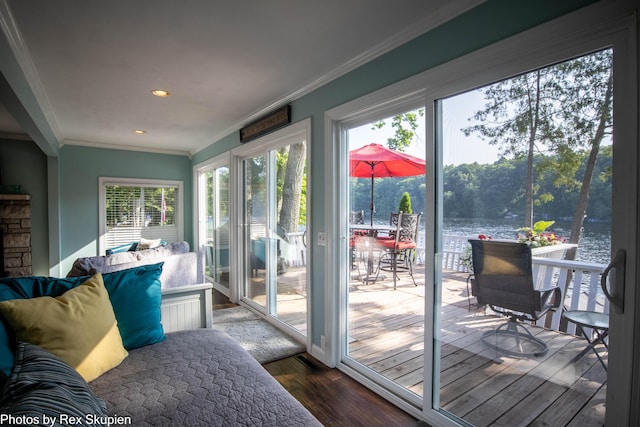 4767 S River St, Newaygo, MI 49337 - sunroom with crown molding, wood finished floors, recessed lighting, and a water view