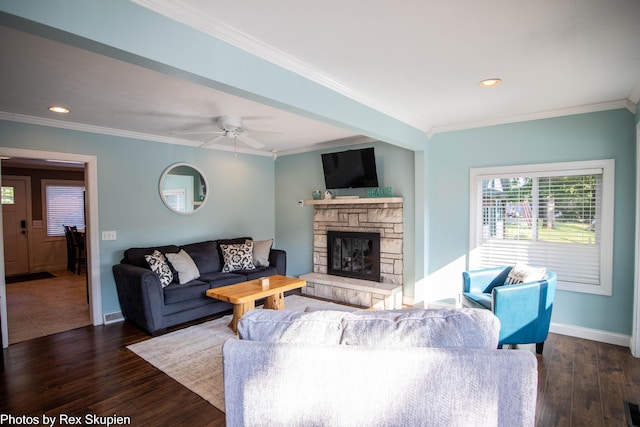 4767 S River St, Newaygo, MI 49337 - living area with ornamental molding, a stone fireplace, hardwood / wood-style flooring, recessed lighting, and a ceiling fan