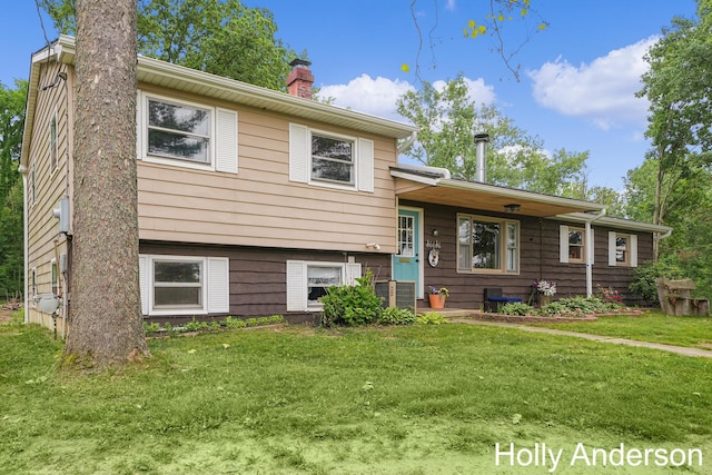 37137 30th St, Paw Paw, MI 49079 - split level home featuring a chimney and a front lawn