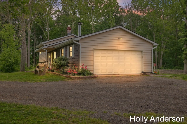 37137 30th St, Paw Paw, MI 49079 - view of front facade featuring driveway, a chimney, and a garage