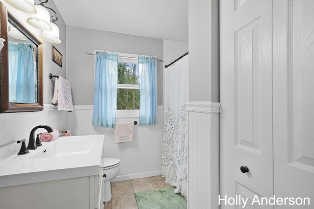 37137 30th St, Paw Paw, MI 49079 - full bath featuring wainscoting, vanity, tile patterned floors, and a shower with curtain