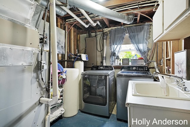 37137 30th St, Paw Paw, MI 49079 - laundry area with cabinet space, washer and clothes dryer, and heating unit