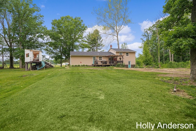 37137 30th St, Paw Paw, MI 49079 - view of green lawn featuring a wooden deck and stairway