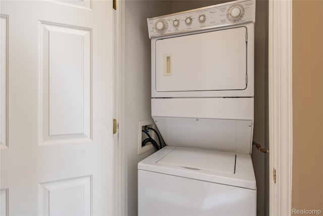 25556 Portico Ln, Novi, MI 48375 - laundry area with stacked washer / drying machine