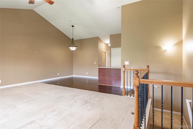 25556 Portico Ln, Novi, MI 48375 - empty room with carpet flooring, high vaulted ceiling, and ceiling fan