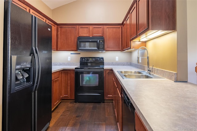 25556 Portico Ln, Novi, MI 48375 - kitchen with black appliances, dark wood-style floors, light countertops, vaulted ceiling, and brown cabinets