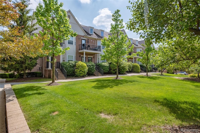 25556 Portico Ln, Novi, MI 48375 - view of home's community featuring a yard