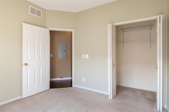 25556 Portico Ln, Novi, MI 48375 - unfurnished bedroom with light colored carpet, a closet, and electric panel