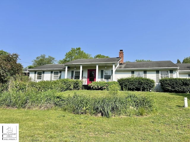7379 N Irish Rd, Otisville, MI 48463 - ranch-style home with a chimney and a front lawn