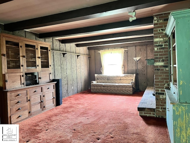 7379 N Irish Rd, Otisville, MI 48463 - interior space featuring wooden walls, carpet flooring, and beamed ceiling