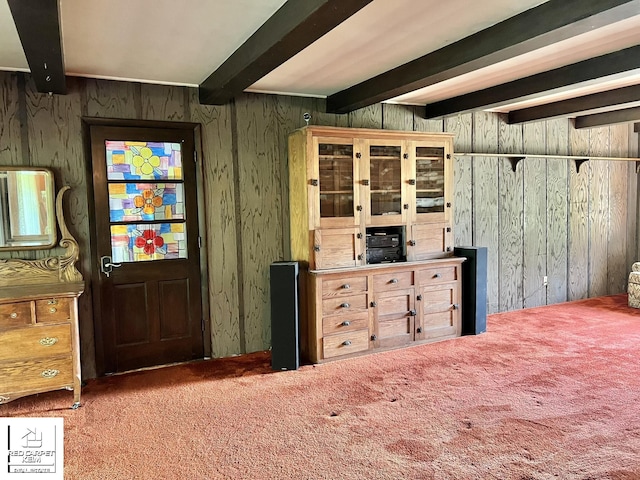 7379 N Irish Rd, Otisville, MI 48463 - foyer entrance featuring carpet floors, beamed ceiling, and wooden walls