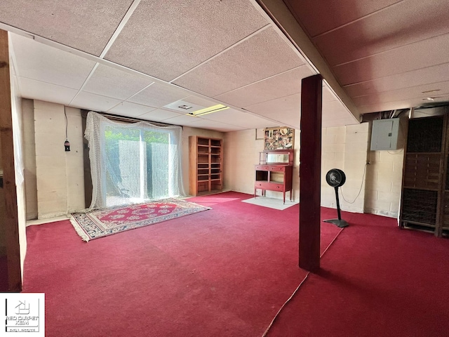 7379 N Irish Rd, Otisville, MI 48463 - basement with carpet flooring, electric panel, and a paneled ceiling