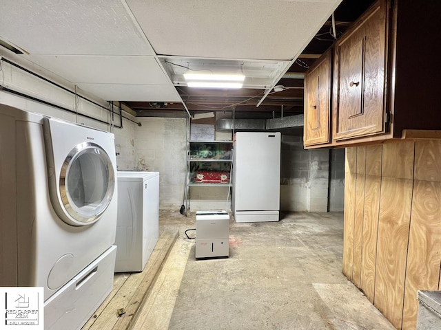 7379 N Irish Rd, Otisville, MI 48463 - unfinished basement with freestanding refrigerator and separate washer and dryer