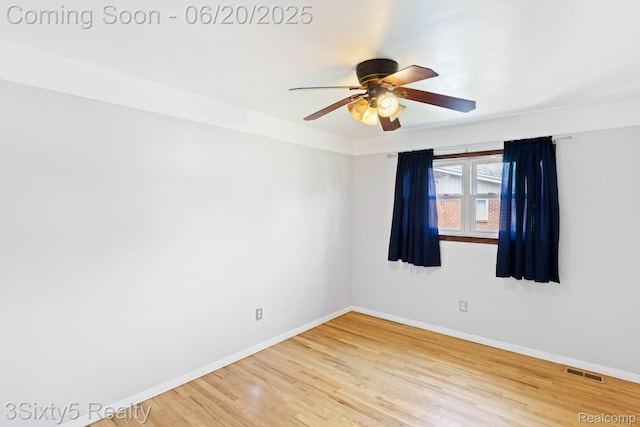 15615 S Midway Ave, Allen Park, MI 48101 - empty room with a ceiling fan and light wood-style floors