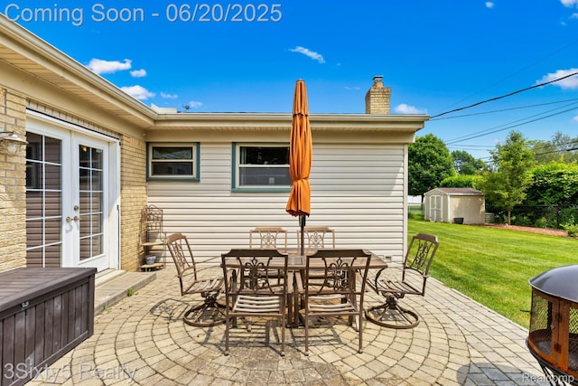 15615 S Midway Ave, Allen Park, MI 48101 - view of patio / terrace featuring a storage unit, french doors, and outdoor dining area