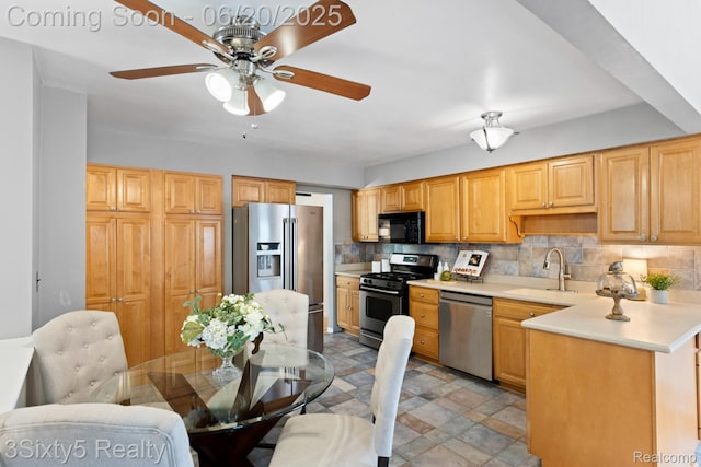 15615 S Midway Ave, Allen Park, MI 48101 - kitchen with stainless steel appliances, backsplash, ceiling fan, and light countertops