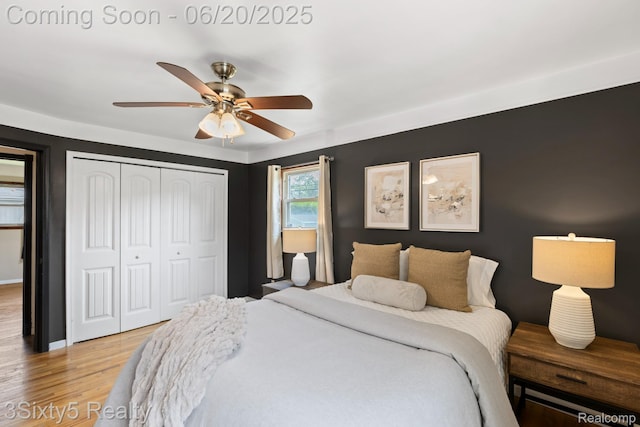 15615 S Midway Ave, Allen Park, MI 48101 - bedroom featuring light wood-style flooring, a closet, and a ceiling fan