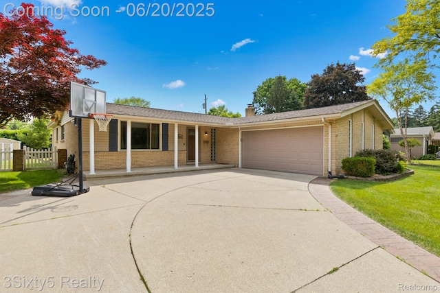 15615 S Midway Ave, Allen Park, MI 48101 - view of front of house with brick siding, a garage, a porch, and a chimney