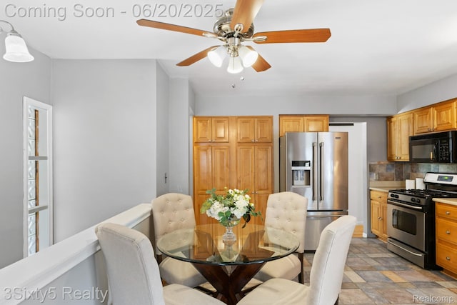15615 S Midway Ave, Allen Park, MI 48101 - dining room featuring ceiling fan and light stone finish floors