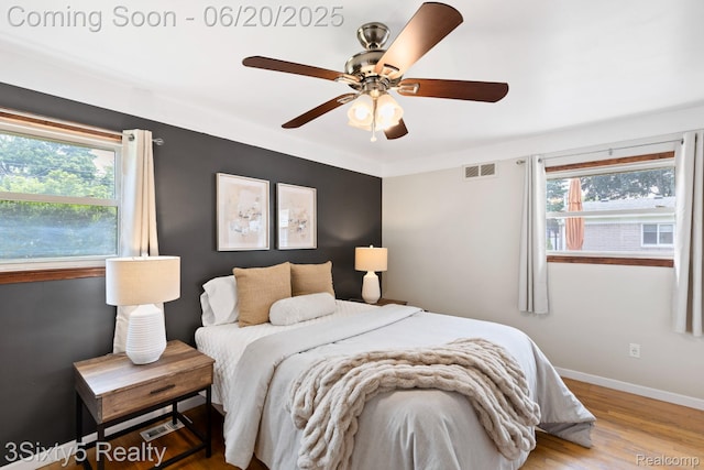 15615 S Midway Ave, Allen Park, MI 48101 - bedroom with wood finished floors and ceiling fan