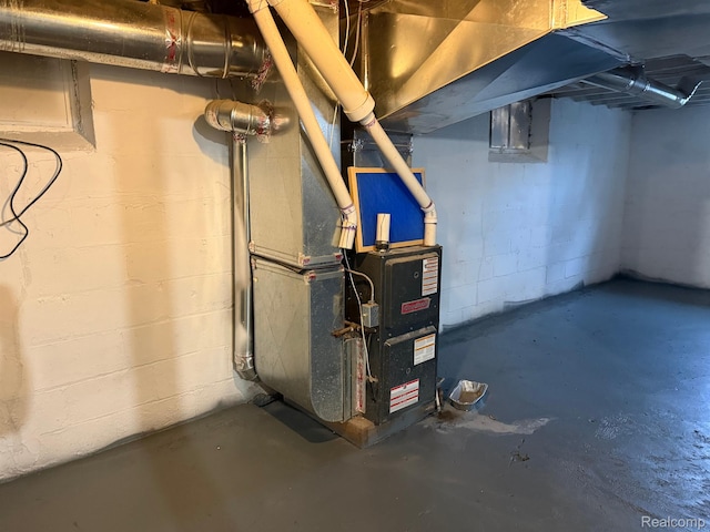 9208 Ward St, Detroit, MI 48228 - unfinished basement featuring heating unit