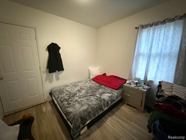 9208 Ward St, Detroit, MI 48228 - bedroom with wood finished floors