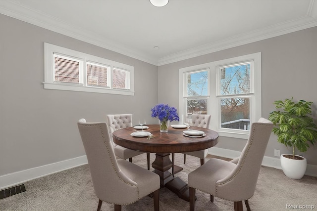 4334 Pacific St, Detroit, MI 48204 - carpeted dining room with baseboards and crown molding