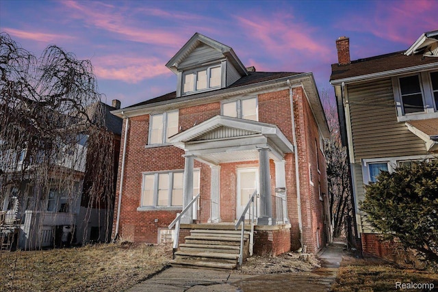 4334 Pacific St, Detroit, MI 48204 - traditional style home featuring brick siding and a chimney