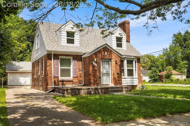 11108 Craft St, Detroit, MI 48224 - new england style home with brick siding, a chimney, a shingled roof, an outdoor structure, and a front lawn