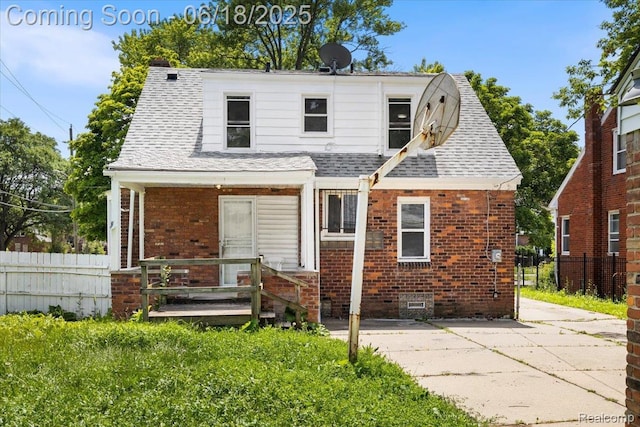 11108 Craft St, Detroit, MI 48224 - view of front of house featuring brick siding and roof with shingles