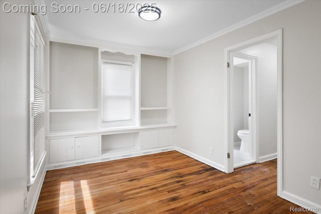 11108 Craft St, Detroit, MI 48224 - empty room with wood finished floors and ornamental molding