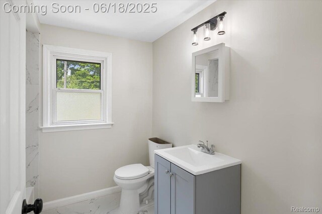 11108 Craft St, Detroit, MI 48224 - bathroom featuring marble look tiles and vanity
