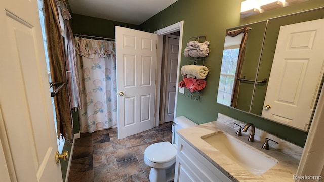 870 Lothrop Rd Unit 6/1, Detroit, MI 48202 - full bathroom with vanity, stone finish flooring, and a shower with shower curtain