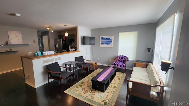 870 Lothrop Rd Unit 6/1, Detroit, MI 48202 - living room with dark wood-type flooring and baseboards