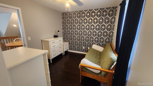 870 Lothrop Rd Unit 6/1, Detroit, MI 48202 - sitting room featuring an accent wall, a ceiling fan, and dark wood-style flooring