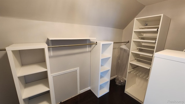 870 Lothrop Rd Unit 6/1, Detroit, MI 48202 - spacious closet featuring lofted ceiling and dark wood-type flooring