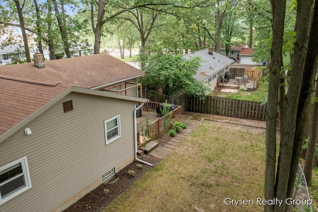 431 Homecrest Ave, Kalamazoo, MI 49001 - view of green lawn with a deck
