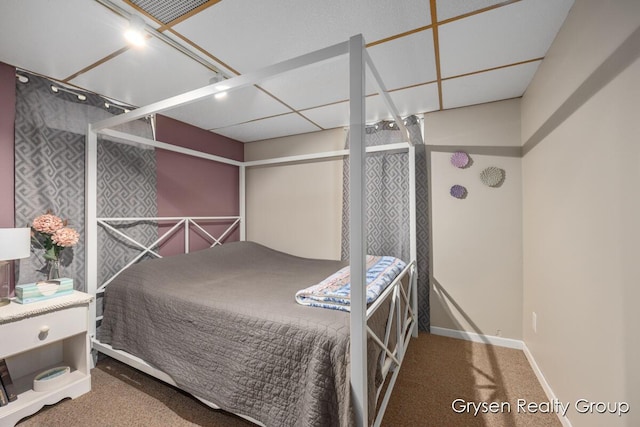 431 Homecrest Ave, Kalamazoo, MI 49001 - bedroom with baseboards and carpet flooring