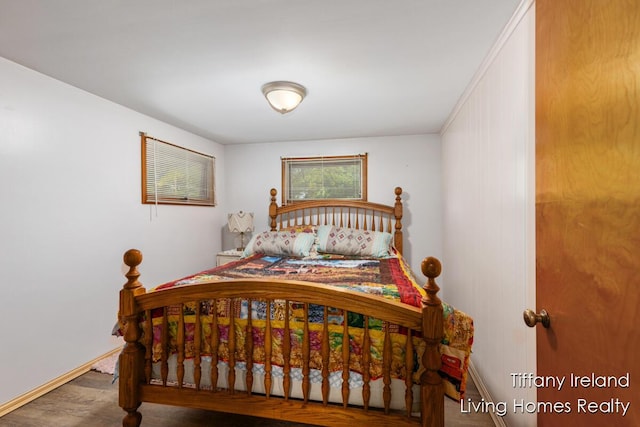 11737 W Carson City Rd, Greenville, MI 48838 - bedroom with wood finished floors and baseboards