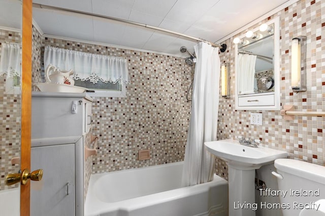 11737 W Carson City Rd, Greenville, MI 48838 - bathroom with tile walls, shower / bathtub combination with curtain, tasteful backsplash, and ornamental molding
