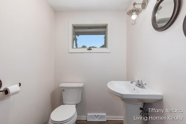 11737 W Carson City Rd, Greenville, MI 48838 - bathroom with toilet and baseboards