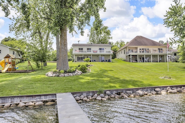 11786 E Sauk Trl, Jerome, MI 49249 - back of property with a yard, a water view, and a playground