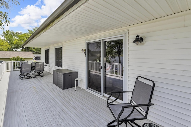 11786 E Sauk Trl, Jerome, MI 49249 - wooden deck featuring outdoor dining space