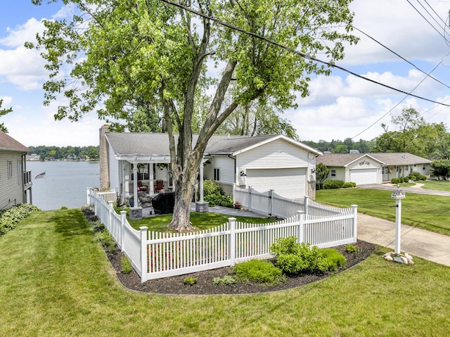 11786 E Sauk Trl, Jerome, MI 49249 - view of front of property featuring a garage, a water view, and a chimney